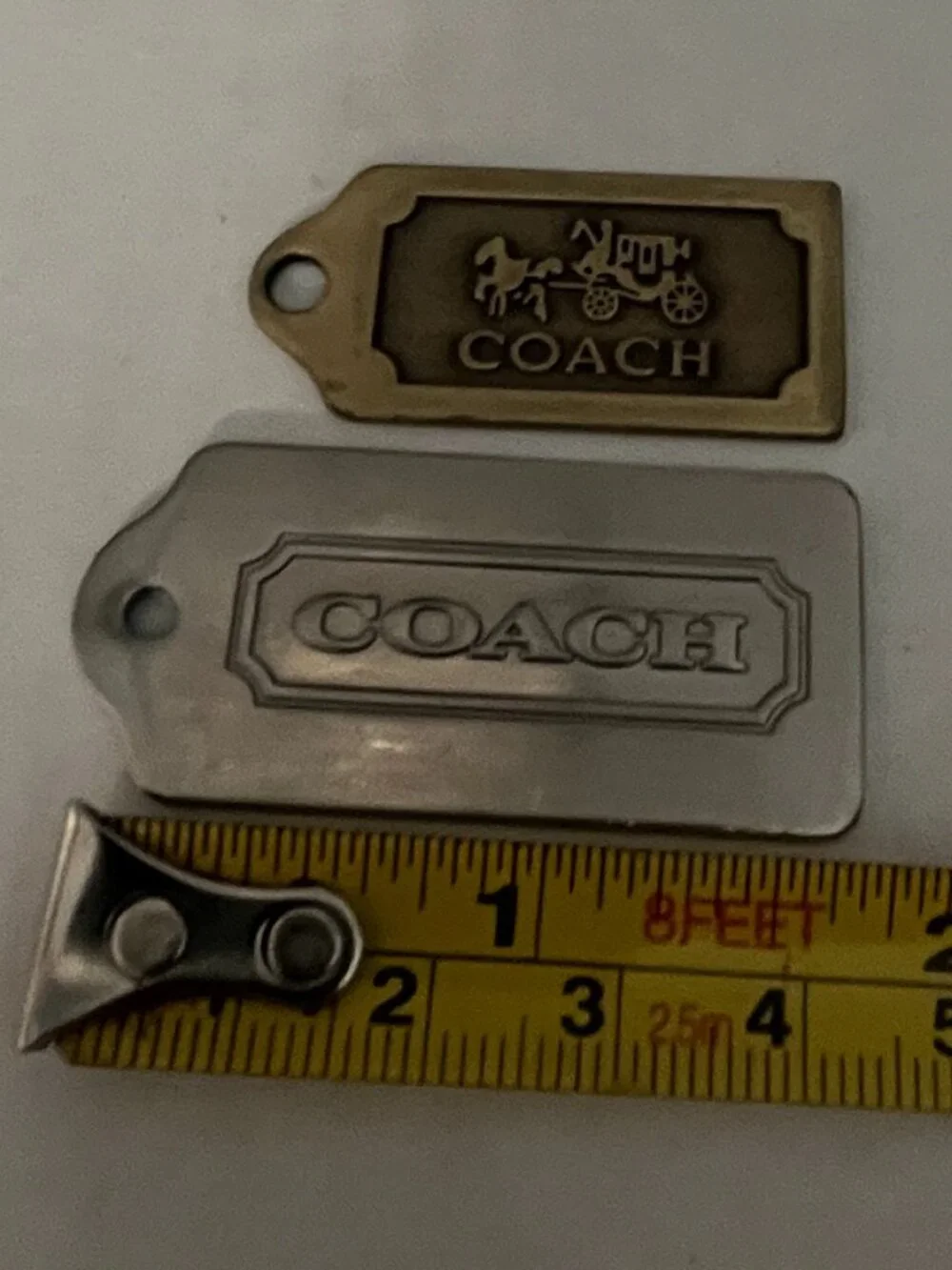 COACH Metallic Tags Silver and Gold